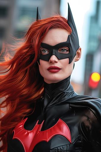 ,::1 , IMAGE_TYPE: Film still, action shot from a few feet away | GENRE: Modern | EMOTION: Serious, prepared | SCENE: photo of a 30 year old Eleanor Tomlinson wearing Batman costume and mask, playing Batwoman/Kate Kane from DC Comics in live action film, red Batman symbol on chest, long flowing red hair, wearing black cape, perched on edge of roof, eyes are completely white | LOCATION TYPE: Top of building looking out over city, night, dramatic lighting | CAMERA MODEL: Canon EOS R5 | CAMERA LENSE: 85mm f/1.8 | SPECIAL EFFECTS: Ultra-detailed, ultra-photorealistic | TAGS: 8k, award-winning photograph --ar 2:3 --v 6.0