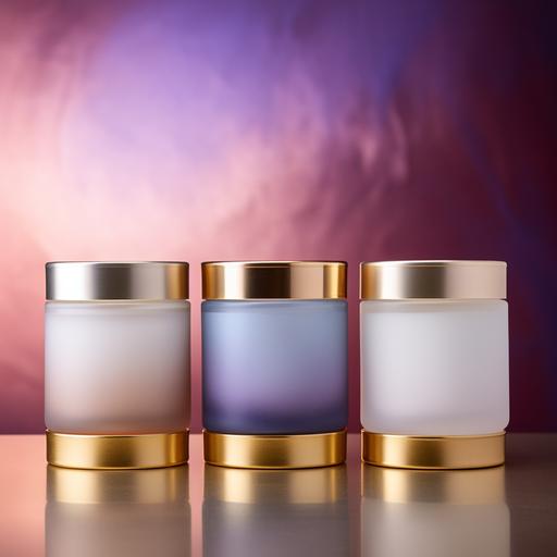 luxury candle line | 12 oz frosted glass tumbler jars | solid color candles | luxury ombre background | luxury aesthetic | 4 candles | dreamy luxury background | gold lids on top of candles | wax not visible in frosted vessles | no text on candles