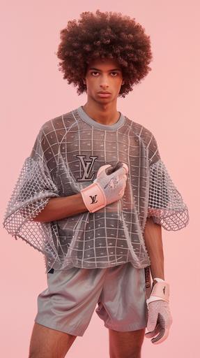 A straight brown male model with brown natural afro wearing a Grey mesh football Jersey, grey shorts, Pink Louis Vuitton fingerless gloves, pink background, super realistic style, --ar 9:16
