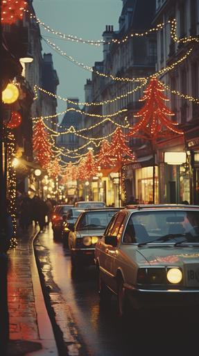 35mm faded photo of 1980s paris street at christmas, 1980s cars parked, christmas lights, christmas bunting --ar 9:16