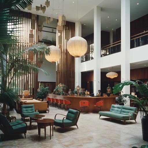 vietnam 1969, two story holet lobby , white walls, 6 rounded pillars, woden front desk, four sets of 3 armchairs each. checker floar