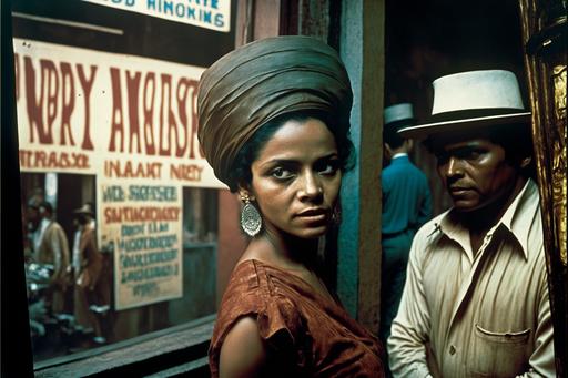 #60s street scene, Mumbai, a hat store. In the window feathered hats. On the entrance door, a poster for a boxing match. Thandiwe Newton stands in front, at night. In the background the front of a bar. Close-up, 1×1, Octane rendering, Kinetic, Hyper detail, 8k, Arriflex 35, Eastman Color Negative I 100T 5247, --ar 3:2