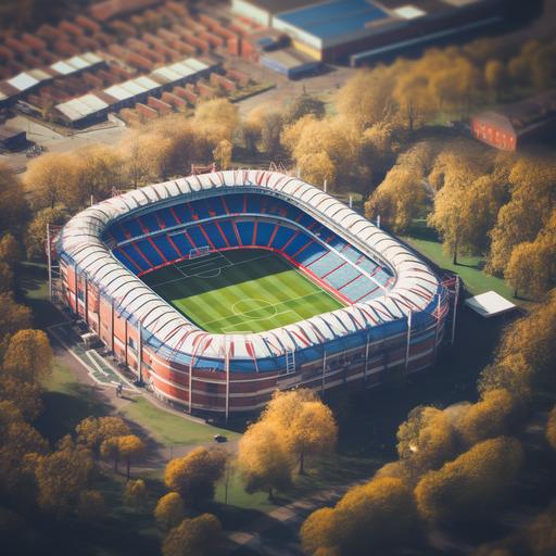 An aerial view of a scale model of a red and blue striped English football stadium, with a logo of a green tree at the stadium entrance with symmetrical framing, pastel colors, and a vintage filter