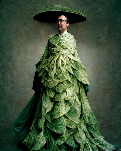 John Oliver wearing a gown made of cabbage leaf, fashion photo shoot, vouge lighting --ar 4:5 --q 1.9