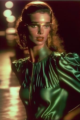 young Brooke Shields 1970s fashion editorial of a photorealistic model wearing green sunglasses , wearing a full length, futuristic-style evening gown made from high-sheen, emerald green, metallic-fabric, ultra realistic, sleeveless with a low-cut bodice and a hyper iridescent fabric, 4k, cinematic --chaos 30 --ar 2:3