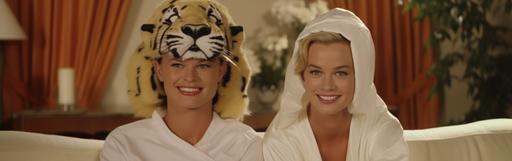 Christine Taylor and Grace Kelly in a two-person tiger costume in Spike Jonze’s classic “The Creation of Adam’s Family” , anachronistic crossover --ar 19:6