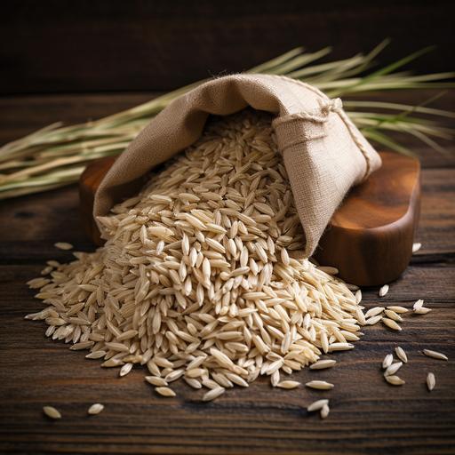 Coarse brown jasmine rice ( milled rice imperfectly cleaned, unpolished or half milled rice ) in hemp sack bag isolated on old rustic wood table background. Healthy food and diet concept. Top view
