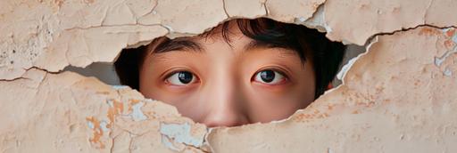 Magazine cover photo, Simple composition, eggshell texture wall, cracks, a hole in the middle, an Asian boy with double eyelids peering forward through the hole, realistic photography, style of cho gi-seok, 8K solution, avoid variable colors, medium shot --v 6.0 --ar 3:1