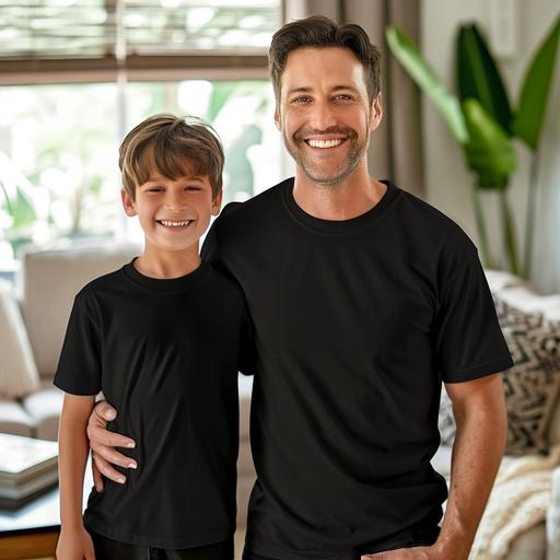 Plain black t-shirt mock-up, smiling and happy 30 year old man and happy 5 year old son, both wearing totally plain black t-shirts, standing front on, very sunny loungeroom background, photo realistic