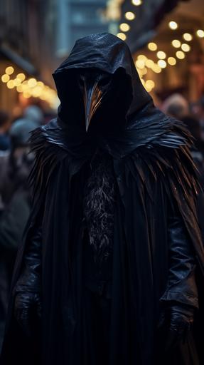 a man in a black robe with a cape and a simple crow mask is standing in a crowded street at night for a festival celebrating crows, he is the killer in a horror film, in the style of I know what you did last summer, dark scary, photo realistic, hyper realistic --ar 9:16