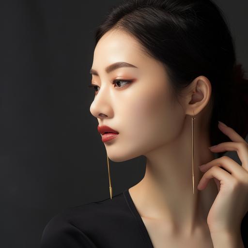 a woman wearring golden thin drop earrings in the form of chopstick, classy