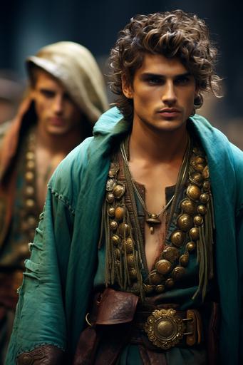 a Dolce Gabbana catwalk fashion photography, two Italian male model dressed in the latest male fusion fashion of an Etruscan warrior tunic blended with the playful saturated colours of couture italian style male fashion, the cloak is short with bronze components, oxidized bronze green, flowing curly hair, photorealistic, daylight, Nikon, high aperture --ar 2:3 --style raw