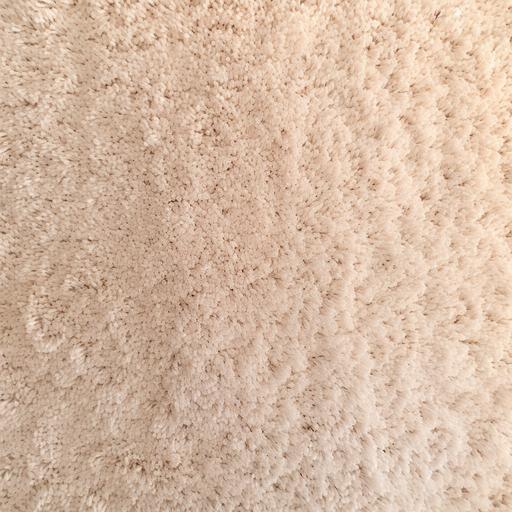 a light beige carpet taken from above