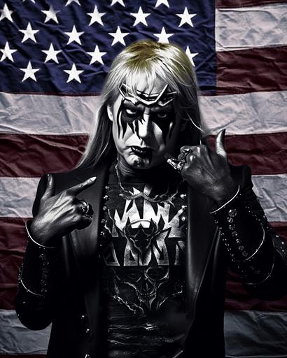 a political poster featuring Donald Trump as A black metal drag queen running for US president would likely have a look that is both dramatic and political. They might wear a black metal band t-shirt or hoodie with a campaign slogan on it, or they might wear a custom-made outfit that incorporates elements of both black metal and American political imagery. Their makeup would still be heavy and dramatic, but it might also include elements that are meant to convey strength, power, and determination. Their hair would still be styled in a long, flowing mane, but it might also be pulled back into a tight bun or ponytail. Here are some specific elements that might be included in a black metal drag queen's look if they were running for US president: *