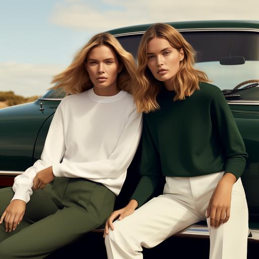 a polo Ralph Lauren women model with blonde long hair sitting on a vintage dark green car, the model is wearing white sweatshirt. Next to the car is standing another model with brown hair and blue eyes wearing a black t shirt and a long skirt, and leaning against the car