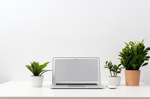 a white desktop and a laptop on a white table with plant, in the style of engineering/construction and design, post-minimalist, animated gifs, minimalist backgrounds, emerald and black, captivating --ar 3:2