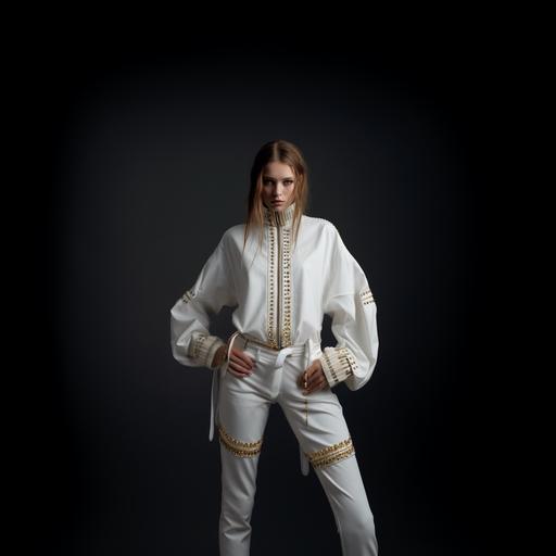 a woman loose white blouse with long sleeves, rib cuffs, lots of details as zippers, studs and white artwort and deco