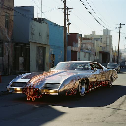 analog picture of a weird, tuned, pimped and customed car, going fast in an empty street of Los Angeles ghetto