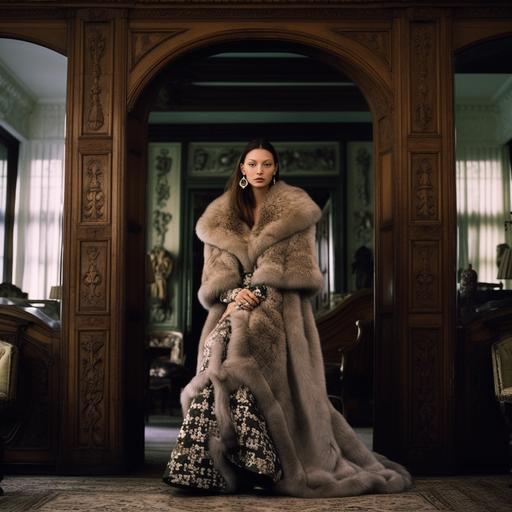annie leibovitz photo of bella hadid wearing a fancy fur robe in a 1970s mansion