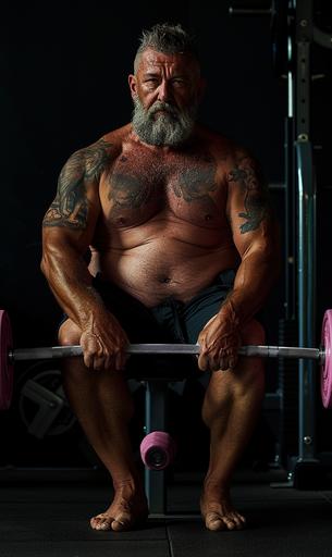 beautifully cinematic photograph, strong man, protruding belly, large body builder, tan skinned man, aged 55, giant muscles, strong arms, big strong chest muscles, tight black gym shorts, barefoot, hairy chest, small wolf tattoo on belly, happy man, colorful image, close up, focused above the waist, sitting on a weight bench in a dark gym, lifting a barbell with pink weights on the end --ar 3:5 --v 6.0