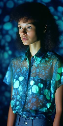 bioluminecent mold fashion, classic fashion shoot shot on Fuji Velvia 50 film, intricate mold patterns, translucant mushrooms, mold spores --ar 1:2 --c 25 --s 750 --v 5 --q 2