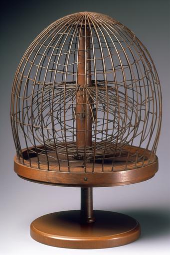 birdcage, a lattice of vertical iron rods, slender and cool, rises from the rounded base of warm, grain-rich wood. Above, a dome of intersecting iron wires forms a metallic sky, its pattern akin to a spider's web. Beneath, a larger wooden disc rests firm, its grain swirling from the center. A smaller disc of wood hangs from the dome, suspended by silky strands. A foot-long branch of an apple tree hangs centrally, its textured surface adorned with knobbly scars of buds and the hieroglyphics of bark. To one side, a small, rectangular door swings open on silent hinges. Two ceramic dishes, shallow and cool, are secured at the bottom of the cage --ar 2:3 --q 2 --v 5