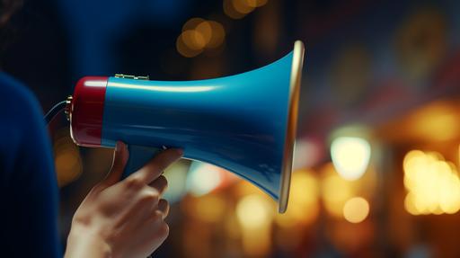 cinematic photography of a female hand holding a vivid blue megaphone with Golden details, close shot, side view, warm light, night background, just hand, 16K --ar 16:9
