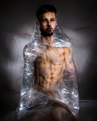 photograph of male fashion model entombed in layers of clear plastic cling wrap, dioptic, wide shot, covered, draped, soft lighting, natural light, rim light, hd, 4k, --ar 3:4
