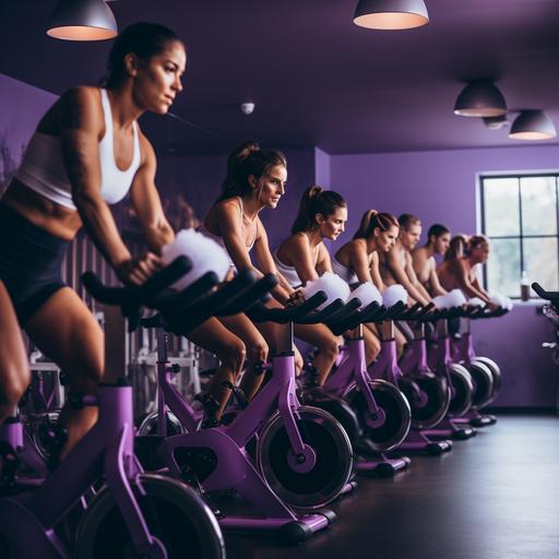a spin class in a purple gym. the bikes grind coffee beans when people ride them.