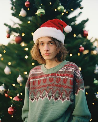 handsome 20 years old man photo with funny chrismas costume with chrismas tree, straight hair, Kodak Portra 800 film 35 mm --ar 4:5 --s 50