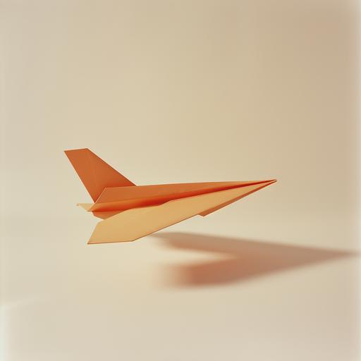 an orange paper aeroplane flying in a photography studio with a cream background