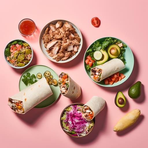 overhead product photo of healthy salad bowls, sandwiches and buritto rolls in a pastel pink background