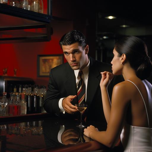 photographic style. a boss and employee are having an argument in a red bar. The boss is a handsome young man with very short black hair wearing a business suit. He is sternly lecturing the employee, a young woman working as a bartender. She is nervous and has long dark hair and tan skin and wears a spaghetti strap tank top. Exquisite detail, highly complex, cinematic lighting, shot on 70mm, vivid color --s 50