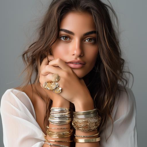 professional jewelry studio photoshoot, close up to a womans neck, white shirt, hands with gold, silver rings, colorful big bracelets, blured white background
