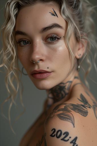 thin woman with beautiful face and blonde hair, tattoo of 