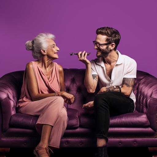 two people on purple sofa, chatting. One older and one in the twenties and black, photographic, both wearing a white top